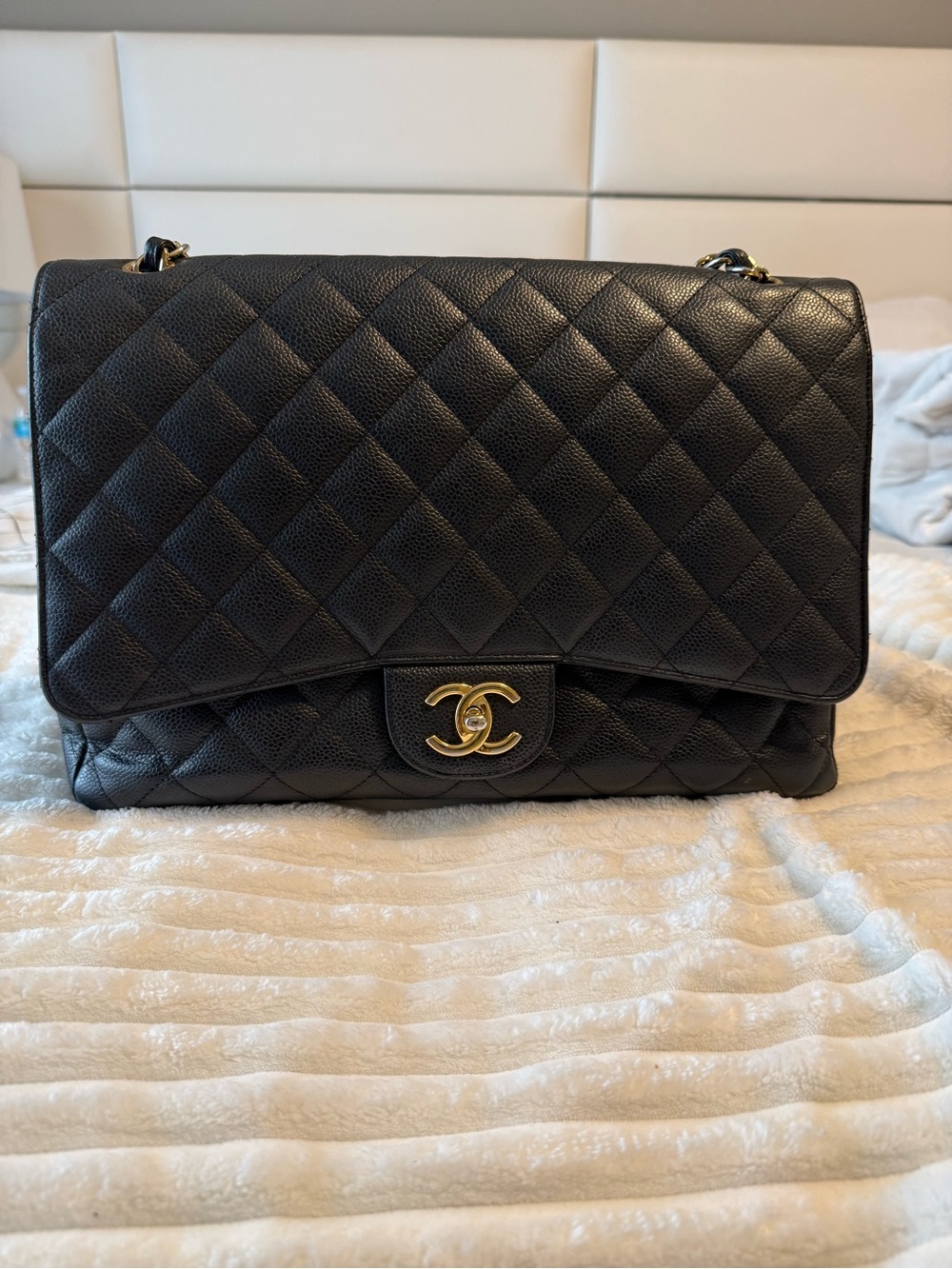 Chanel Maxi Classic Double Flap Black Caviar Leather Gold Hardware